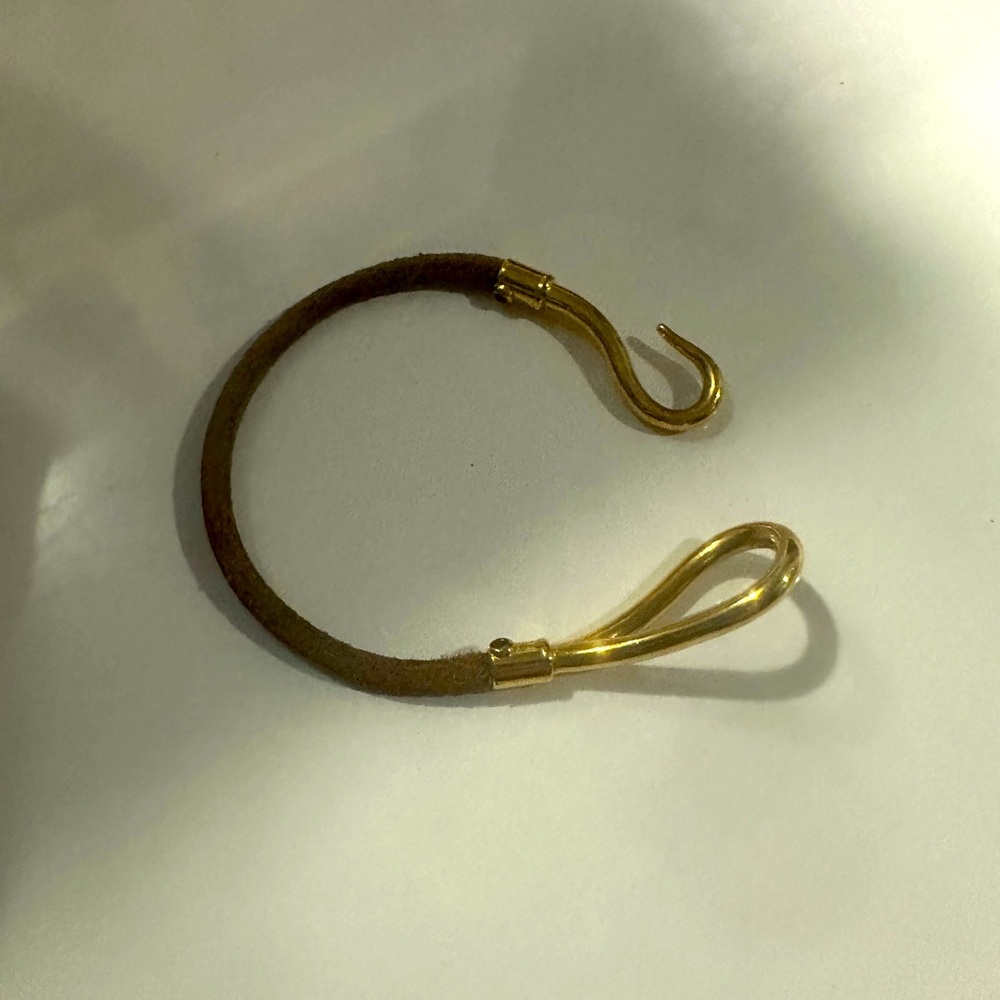 Hermes leather chord bracelet.  Unisex. Excellent used condition.